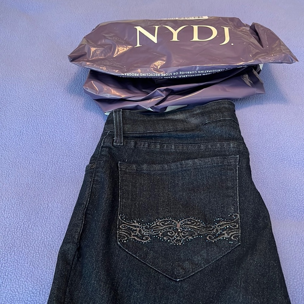 NYDJ Straight leg.  Never worn.  Detail on the pockets.